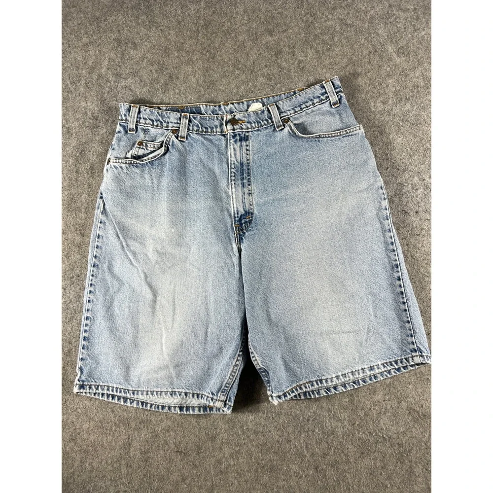 Vintage Levis 560 Loose Fit Denim Shorts Mens 36 Light Wash Blue Made in USA 90s